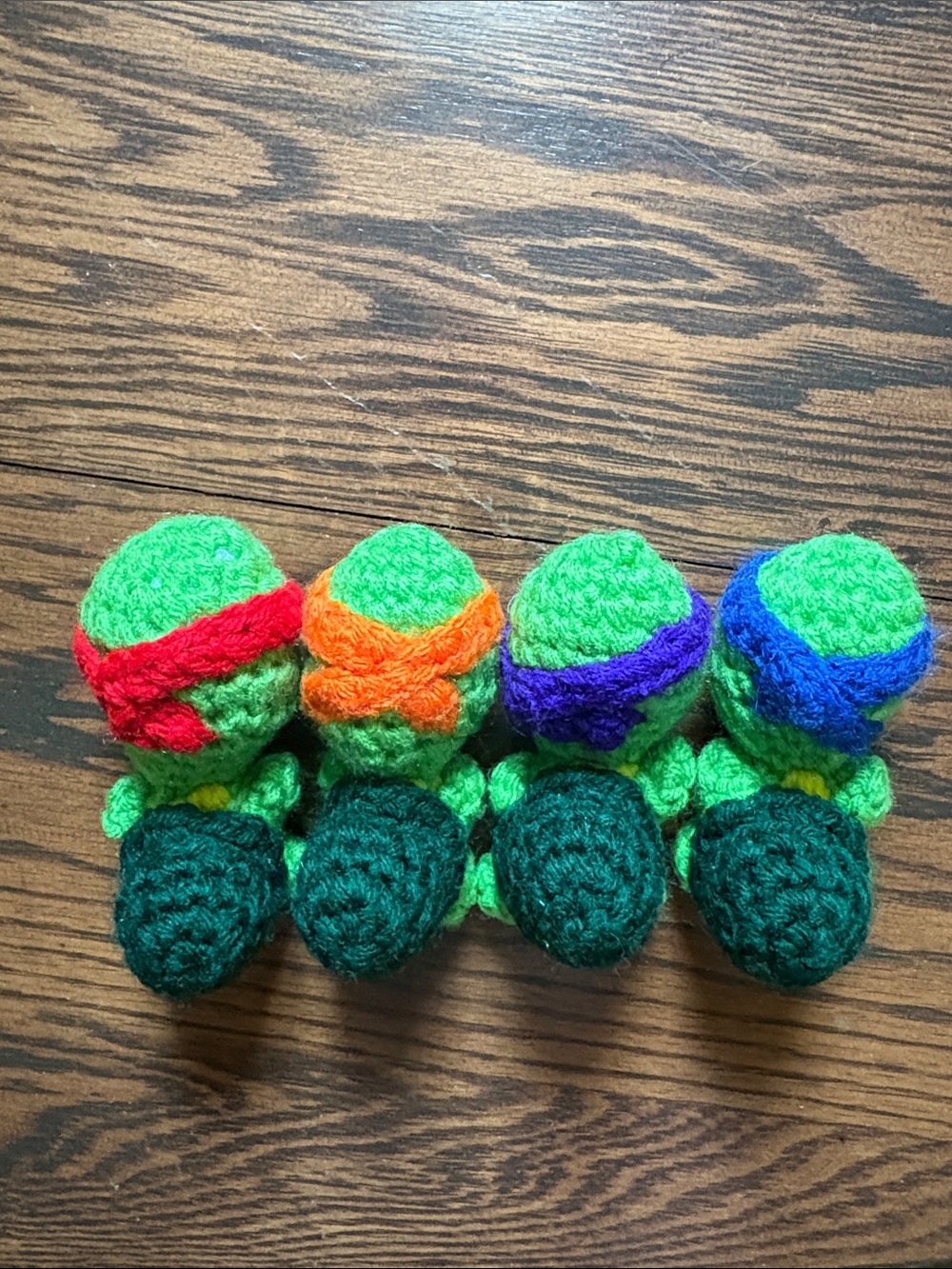 Cute Green Crochet Turtle Plush Set with Red, Orange, Purple & Blue Masks - Picture 2 of 5